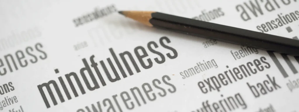 Person meditating to find calm and reduce anxiety through mindfulness