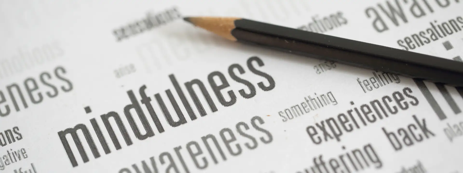 Person meditating to find calm and reduce anxiety through mindfulness