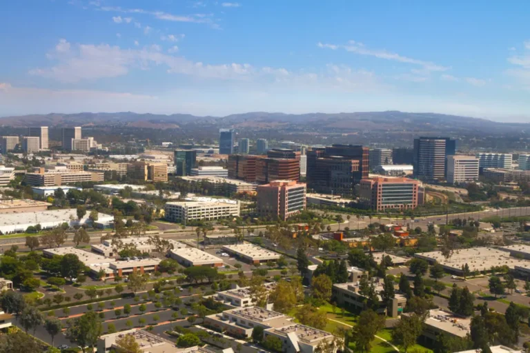 Person walking outdoors in a tranquil setting symbolizing emotional recovery and renewal