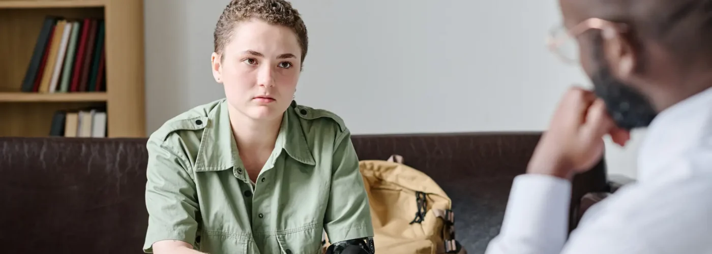 Therapist supporting a patient in processing and healing from a traumatic experience